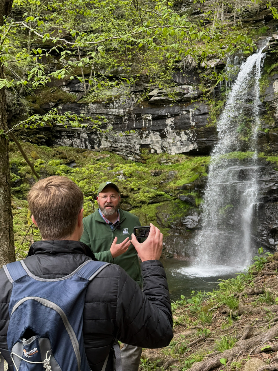 Jeff Senterman being filmed at Platte Clove in front of Plattekill Falls.